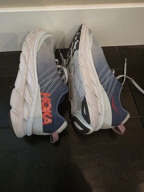 Hoka One One Navy Blue Sneakers with Orange Logo Accents
